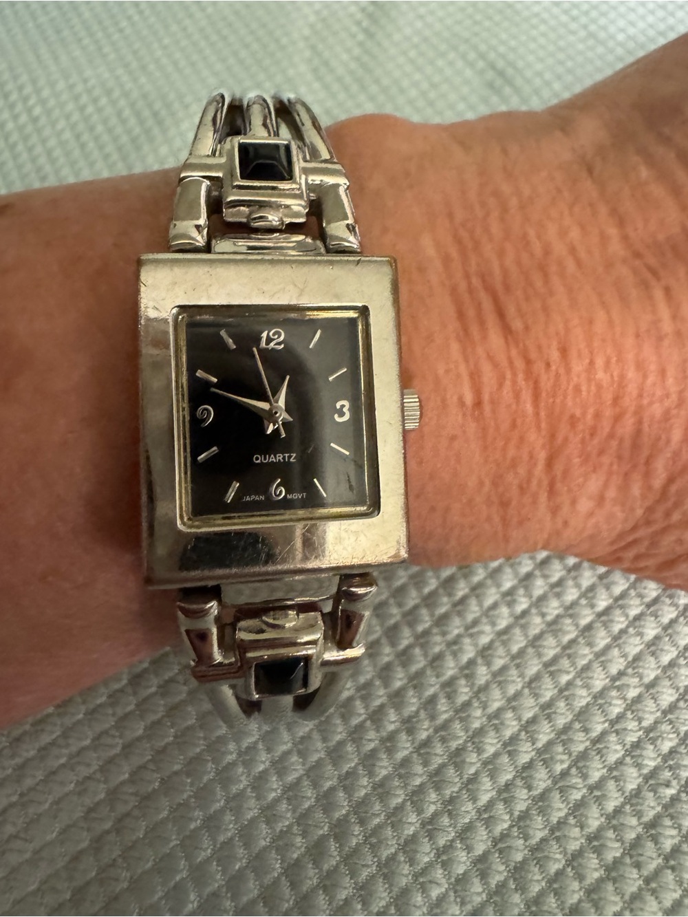 Rare Avon Silver-Tone Bracelet Watch with Black Dial and Accents